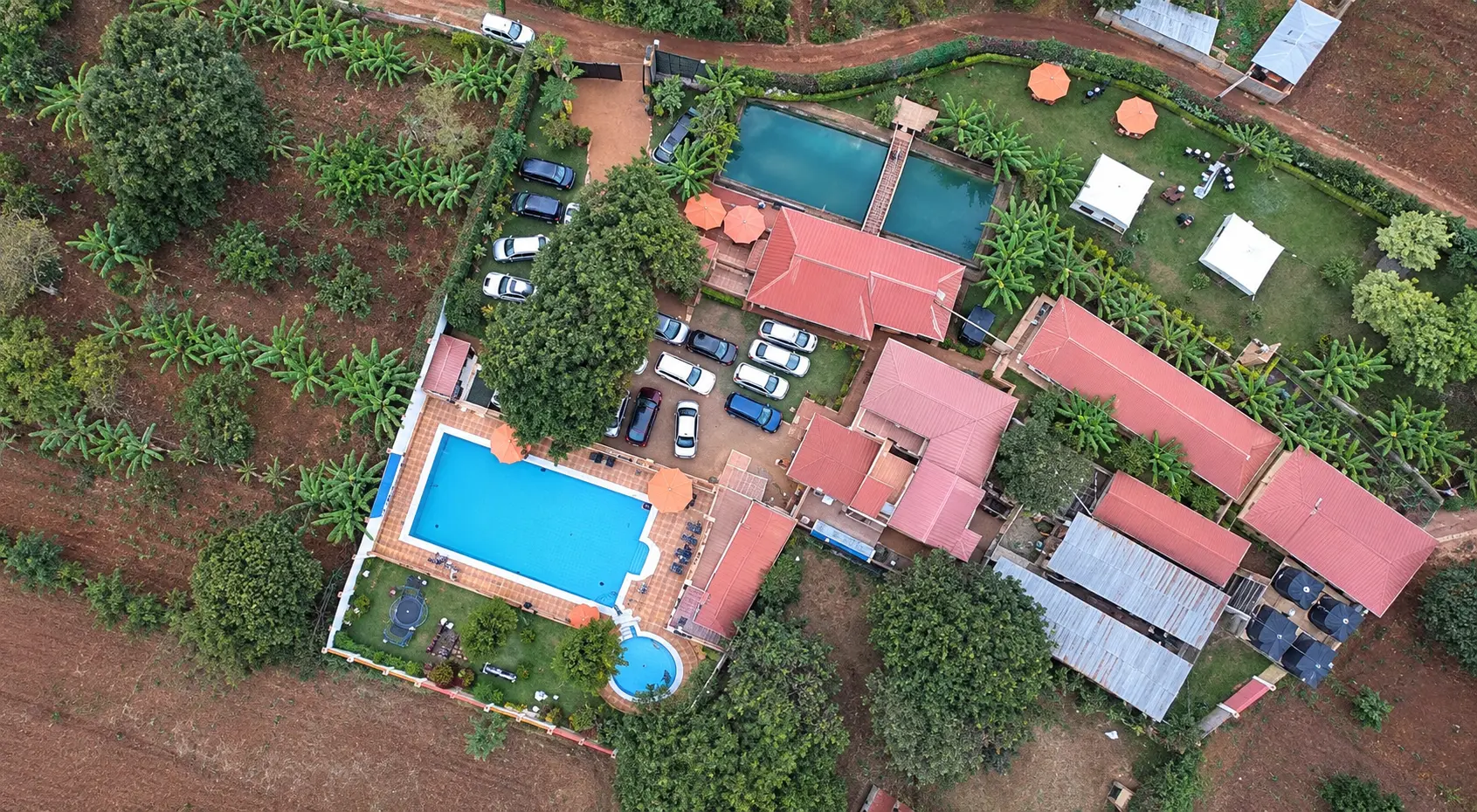 Aerial View of Kyeni Resort Grounds, Swimming Pool & Fish Ponds